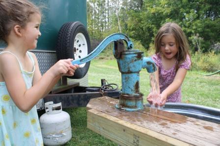 Hand Pumping Water